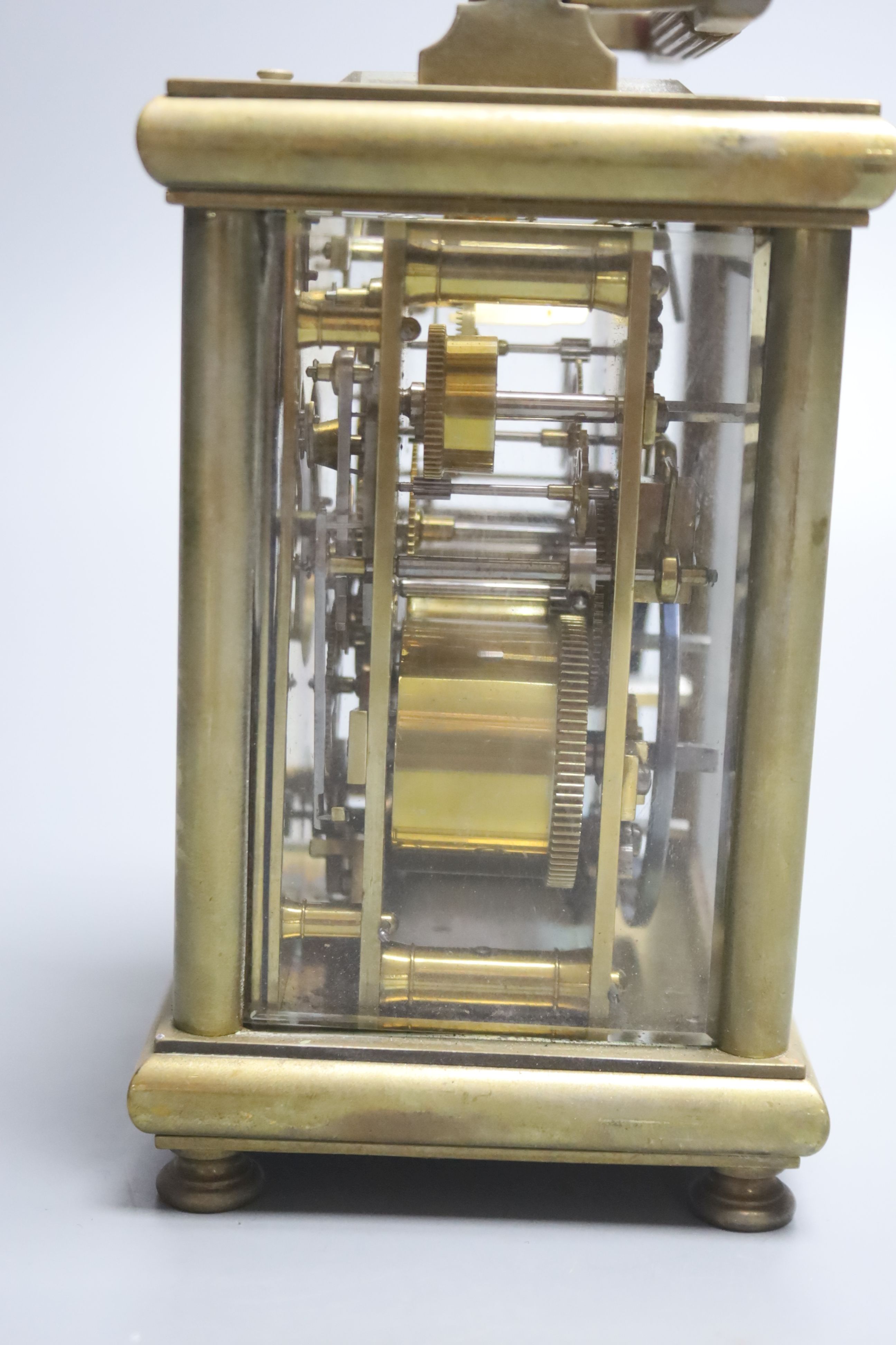 An E. Maurice & Co hour repeating carriage clock, height 16cm with handle down